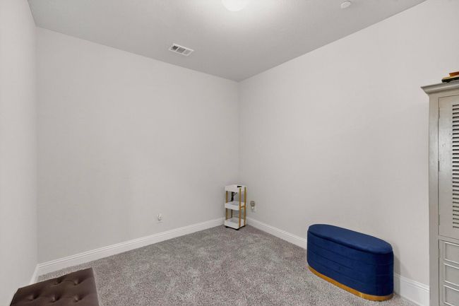 Carpeted spare room featuring baseboards | Image 27