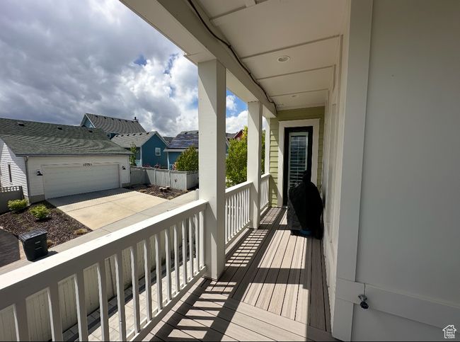 View of balcony on wrap around side of covered deck | Image 79