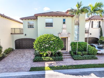 104 Via Poinciana Lane, Townhouse with 4 bedrooms, 3 bathrooms and null parking in Boca Raton FL | Image 1