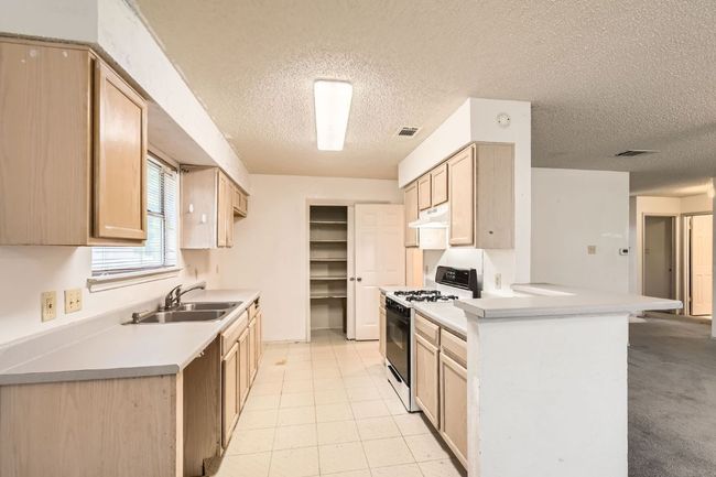 10421 Cayuse Cv, House other with 3 bedrooms, 2 bathrooms and 4 parking in Austin TX | Image 11