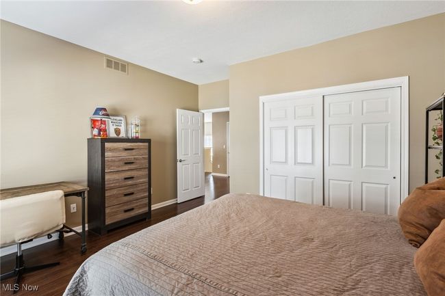 Another look showcasing the bedroom’s space, layout and double closet | Image 30
