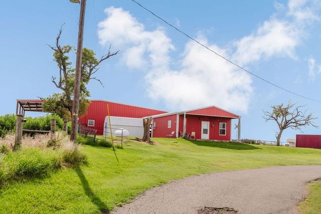 View of front yard, tiny house and barn | Image 4