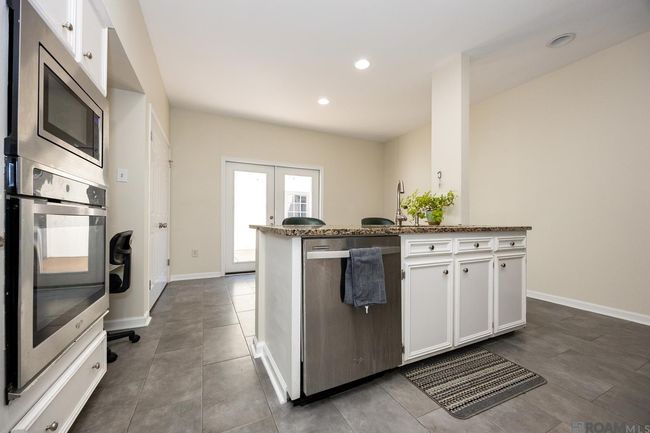 10218 N Magna Carta Pl, Townhouse with 4 bedrooms, 3 bathrooms and 2 parking in Baton Rouge LA | Image 9