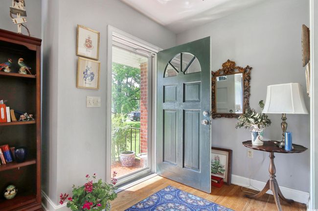 Entrance foyer with wood finished floors and baseboards | Image 6