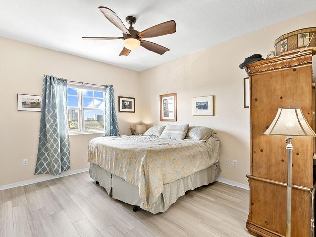 master bedroom en suite with walk in closets, built out | Image 15