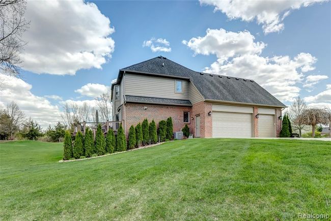 Large 3 car attached garage with plenty of parking room | Image 38