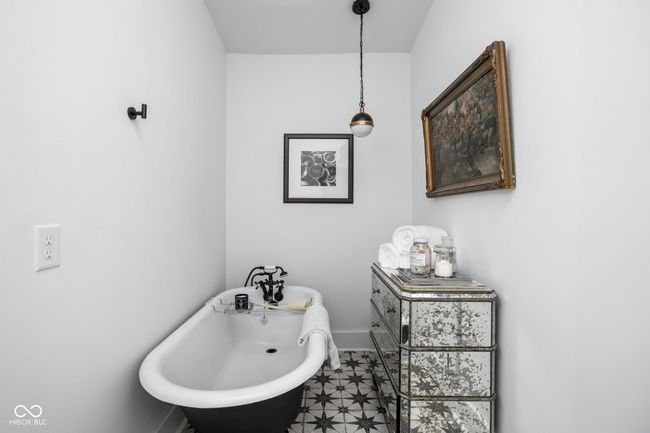 Clawfoot tub in bathroom off kitchen area | Image 21
