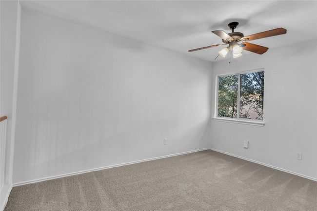 Empty room featuring carpet and ceiling fan | Image 23