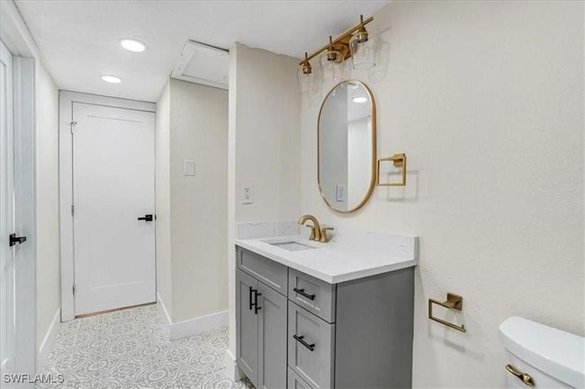 Bathroom featuring vanity, recessed lighting, and tile patterned floors- Virtually edited | Image 22