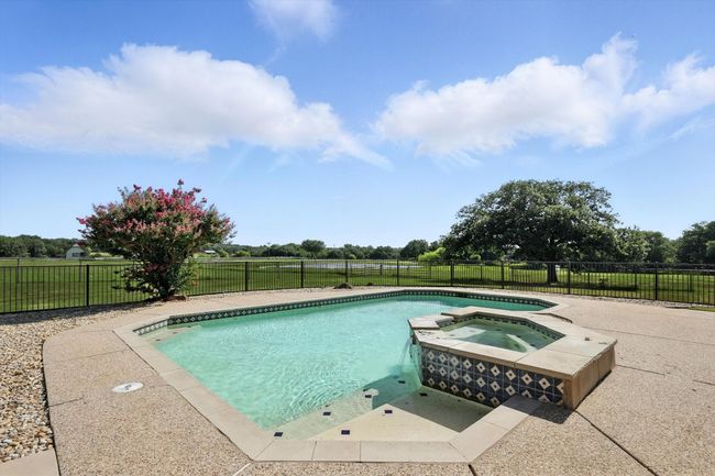 View of pool with a pool with connected hot tub | Image 27