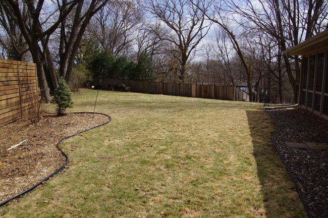Side Yard off 3 Season Porch! | Image 6