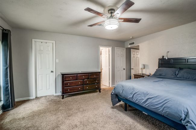 Bedroom with carpet floors and ceiling fan | Image 19