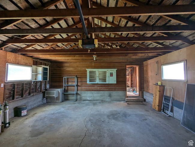 Garage featuring a garage door opener | Image 36