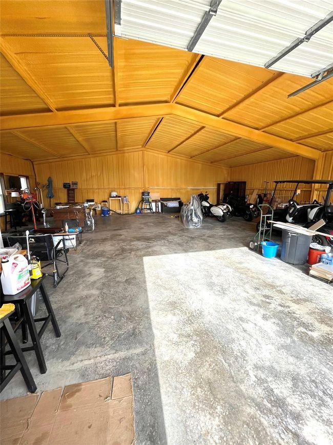 Garage with wooden walls | Image 24
