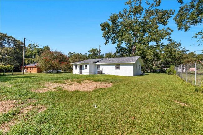 View of yard featuring fence | Image 4