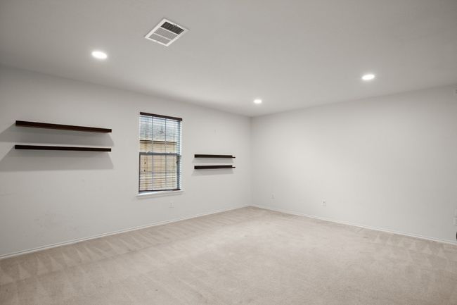 Spare room featuring recessed lighting, visible vents, and light carpet | Image 28