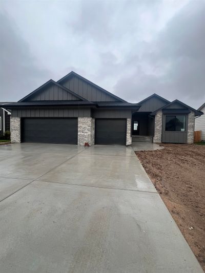 View of front of property featuring a garage | Image 1