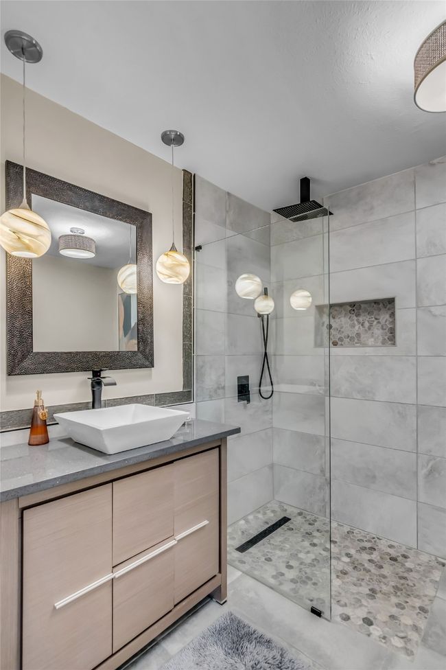 Full bathroom featuring walk in shower and vanity | Image 14