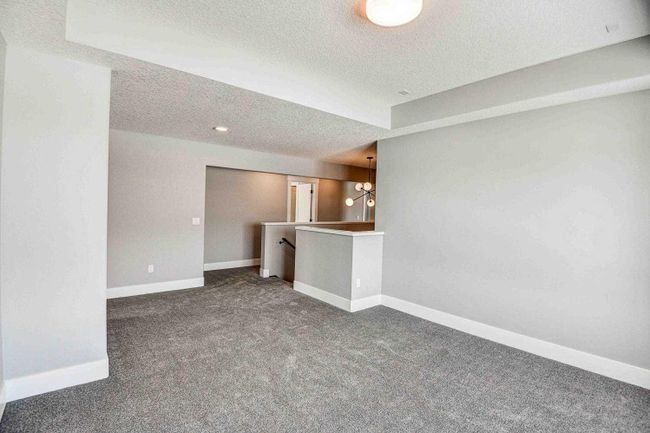 1209 Coopers Drive Sw, Home with 4 bedrooms, 2 bathrooms and 3 parking in Airdrie AB | Image 26