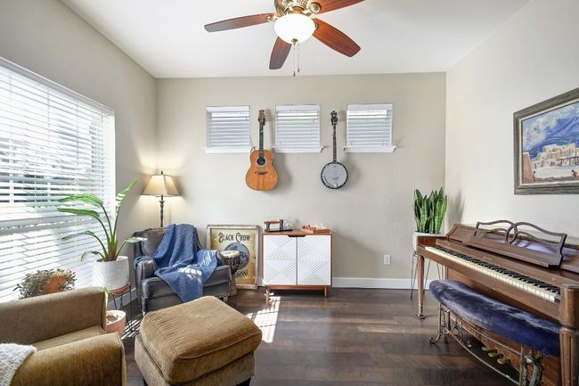 This space features several windows, a ceiling fan, and plenty of space for adding your personal touch. | Image 5