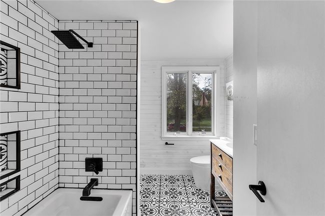 Guest bath which has a secret door to a special space | Image 26