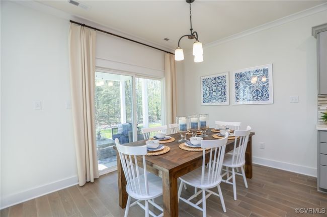 Separate breakfast area open to kitchen. | Image 8
