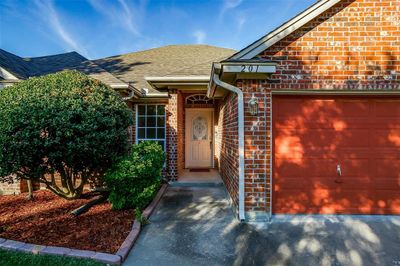 Property entrance featuring a garage | Image 2