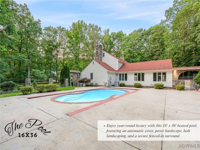 Enjoy year-round luxury with this 16' x 36' heated pool, featuring an automatic cover, paver hardscape, lush landscaping, and a secure fenced-in surround. | Image 40