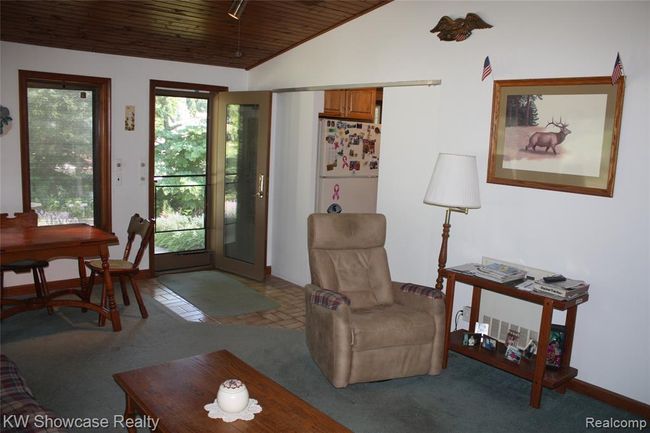 Sunroom, looking towards the kitchen entrance. Hang a sliding barn door for more privacy. | Image 15