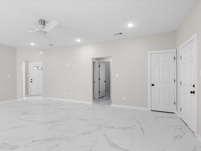 Spare room with visible vents, recessed lighting, marble finish floor, and baseboards | Image 10