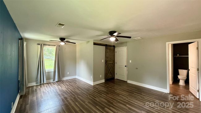 Rear BR With W.I.C and bathroom on Right | Image 16