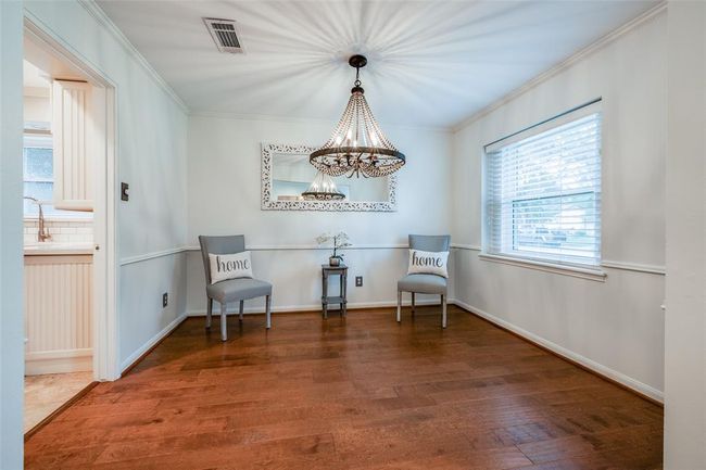 Home Office or second living room, hardwood floors, beautiful chandelier, large window allows lots of natural light | Image 5