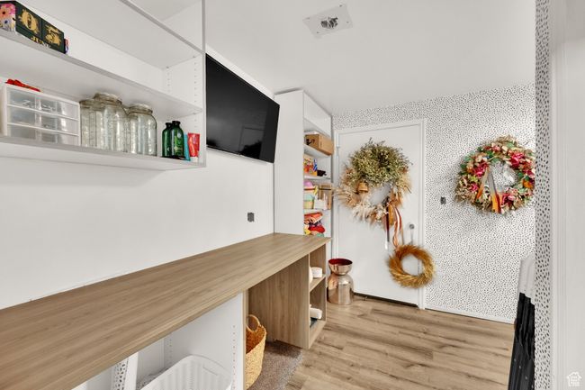 Mudroom with wood finished floors | Image 24