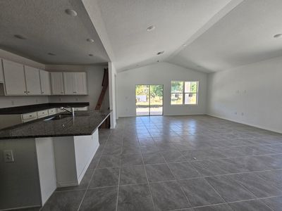 Open Great Room and Kitchen with vaulted ceiling | Image 2