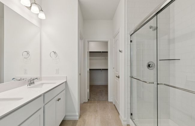 Luxurious owner's bath complete with double sinks and a generous shower *Real home pictured | Image 13
