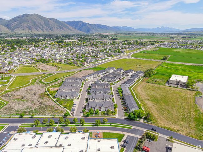 Aerial perspective of suburban area featuring a mountainous background | Image 30