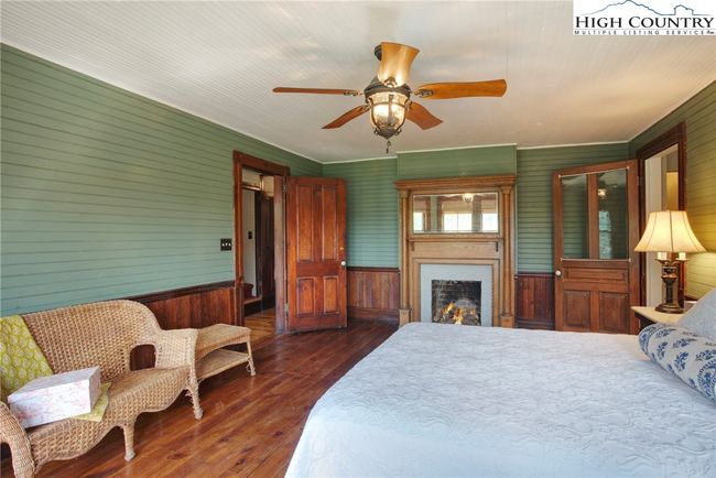 Fireplace in primary bedroom. | Image 24