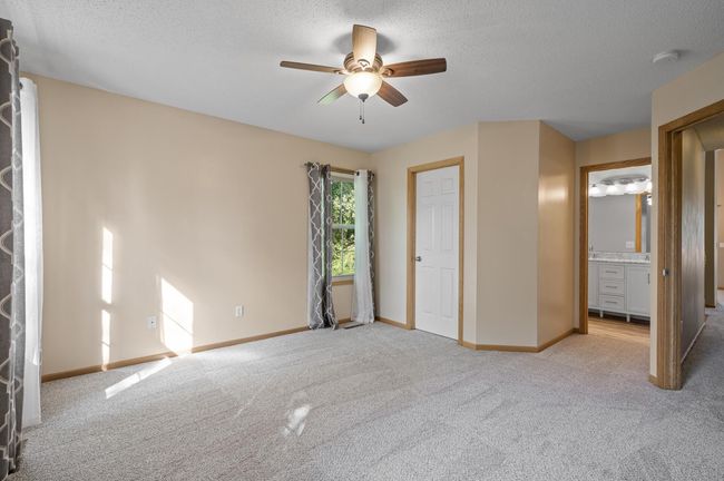 Primary bedroom with new carpet | Image 18