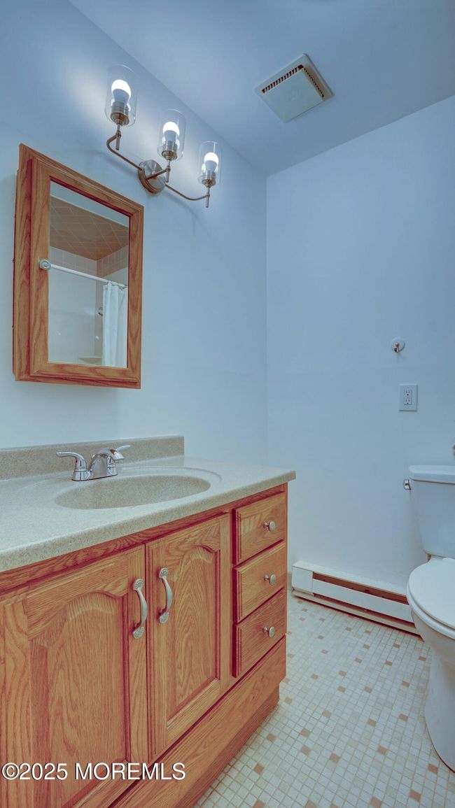 Primary bath with stall shower. | Image 26