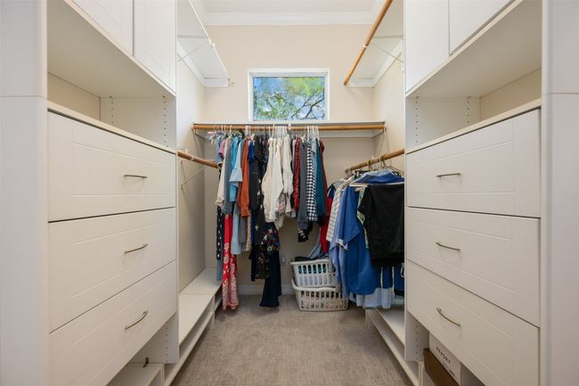 This spacious closet is one of three closets in the primary suite area. | Image 17