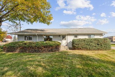 Single story home featuring a front yard | Image 1