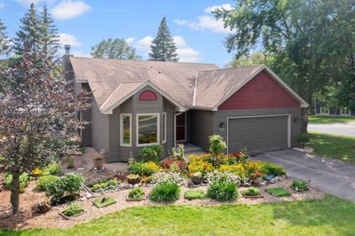 This beautiful 5-bedroom, 2-bathroom home is nestled in a quiet, desirable Chanhassen neighborhood. | Image 1