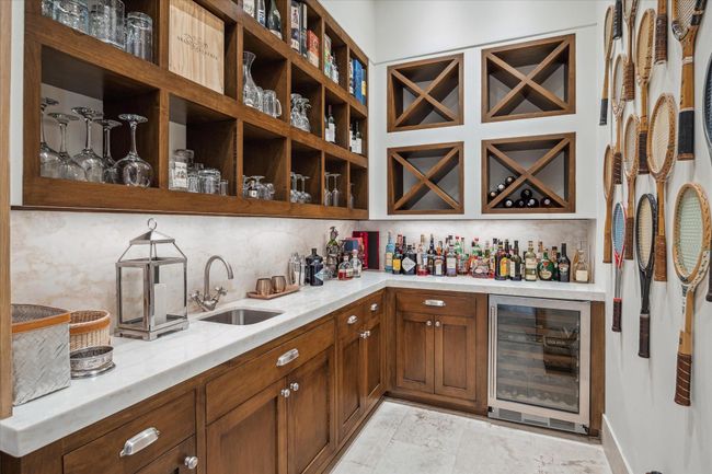 Tennis anyone? Or what about a cocktail or a glass of wine. | Image 7