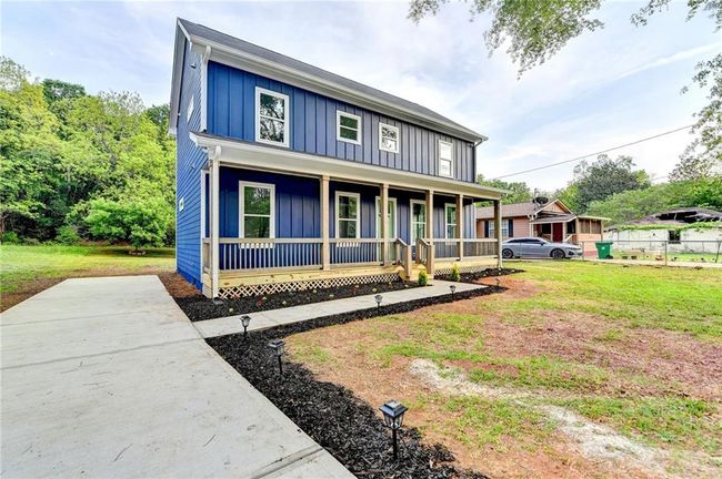 6893 Magnolia St, House other with 4 bedrooms, 3 bathrooms and null parking in lithonia GA | Image 4
