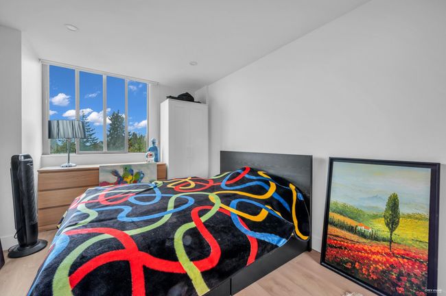 Bedroom featuring wood finished floors | Image 23