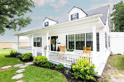 View of front of house with a front yard and a porch | Image 3