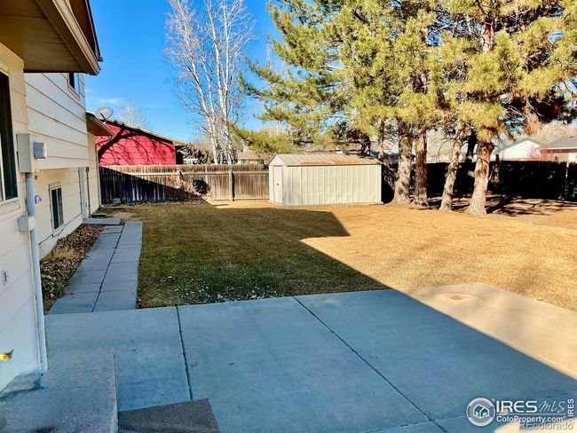 North View off Patio with Metal Storage Shed | Image 23