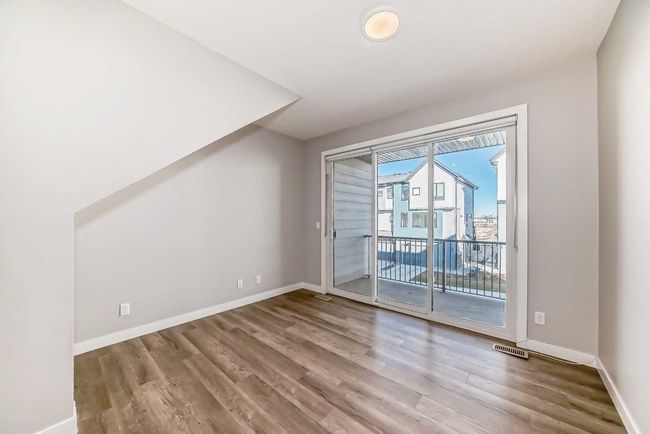 207 Evanscrest Square Nw, Townhouse with 2 bedrooms, 3 bathrooms and 1 parking in Calgary AB | Image 12