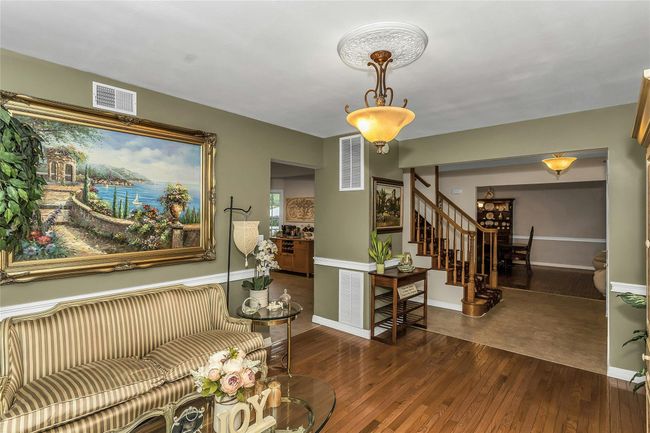 Comfortable Sitting Room Overlooking The Front Porch | Image 4