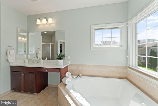 18985 Coreopsis Ter, Townhouse with 3 bedrooms, 4 bathrooms and null parking in LEESBURG VA | Image 48